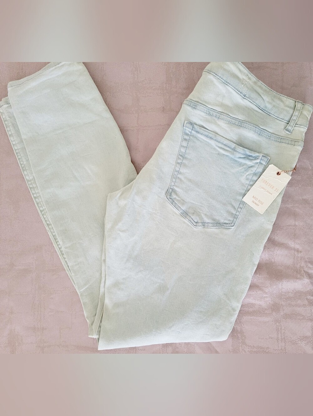 Forever 21 Light Wash Skinny Jeans with Knee Rips